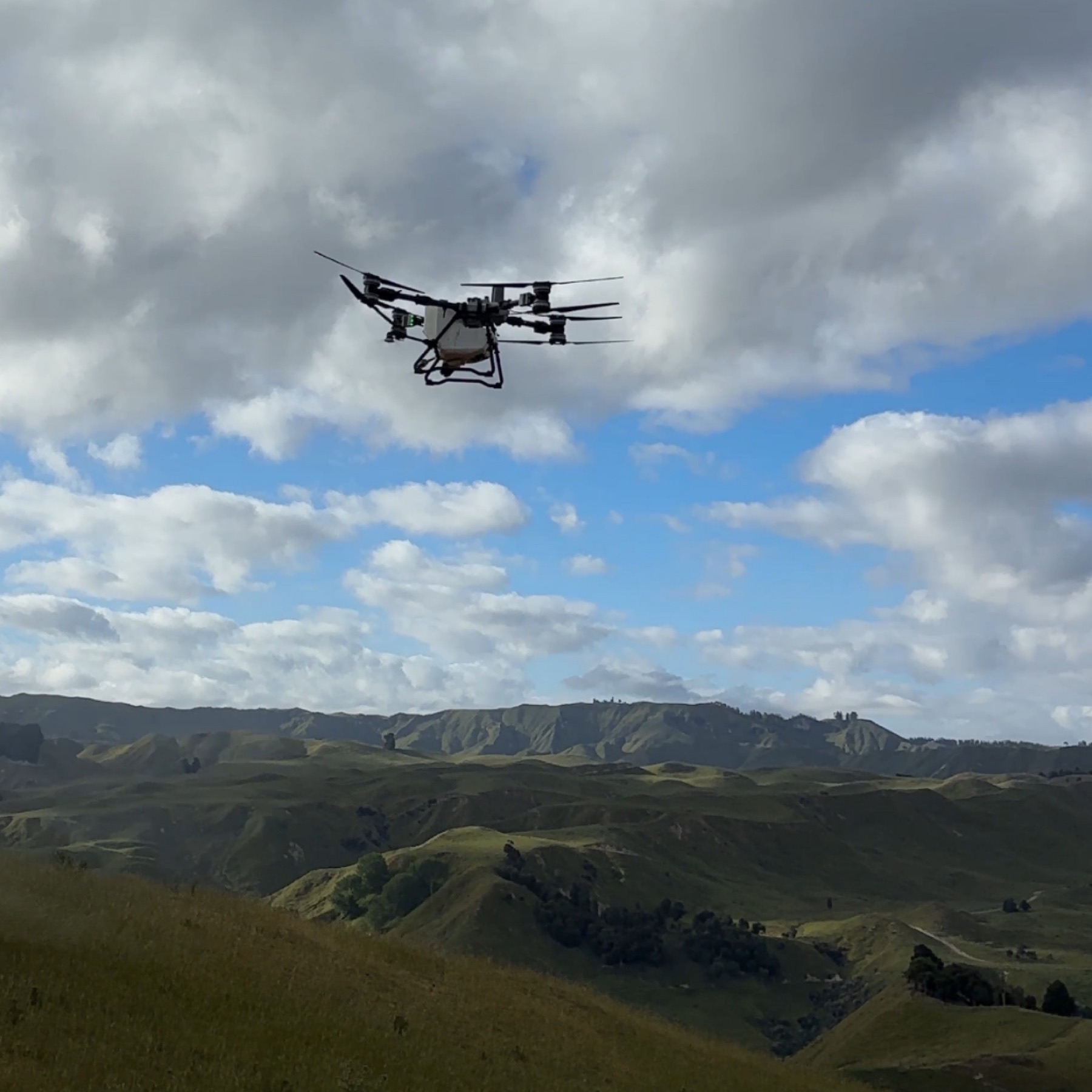 Spreading drone flying over Hawke's Bay hill country